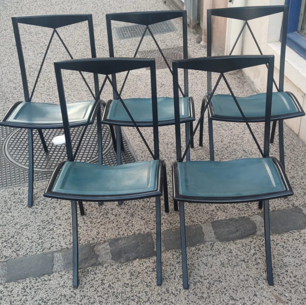 5 Bella folding chairs in steel and petrol blue leather by Maison Cattelan