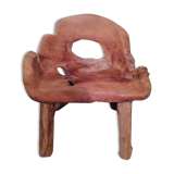 Fauteuil taillé dans une pièce de bois