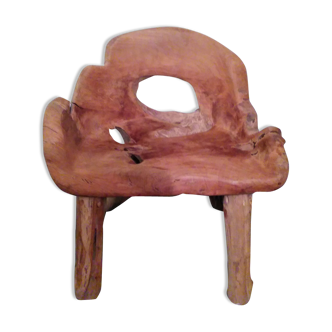 Chair carved from a piece of wood