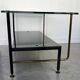 Modernist coffee table in metal tubular base and glass top 1950