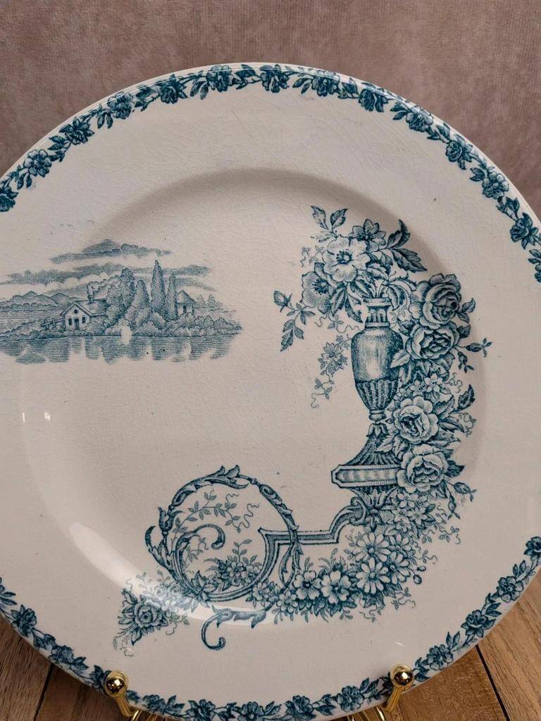 Dessert plate in ironstone Clairefontaine model Buffon blue with old landscape decoration.