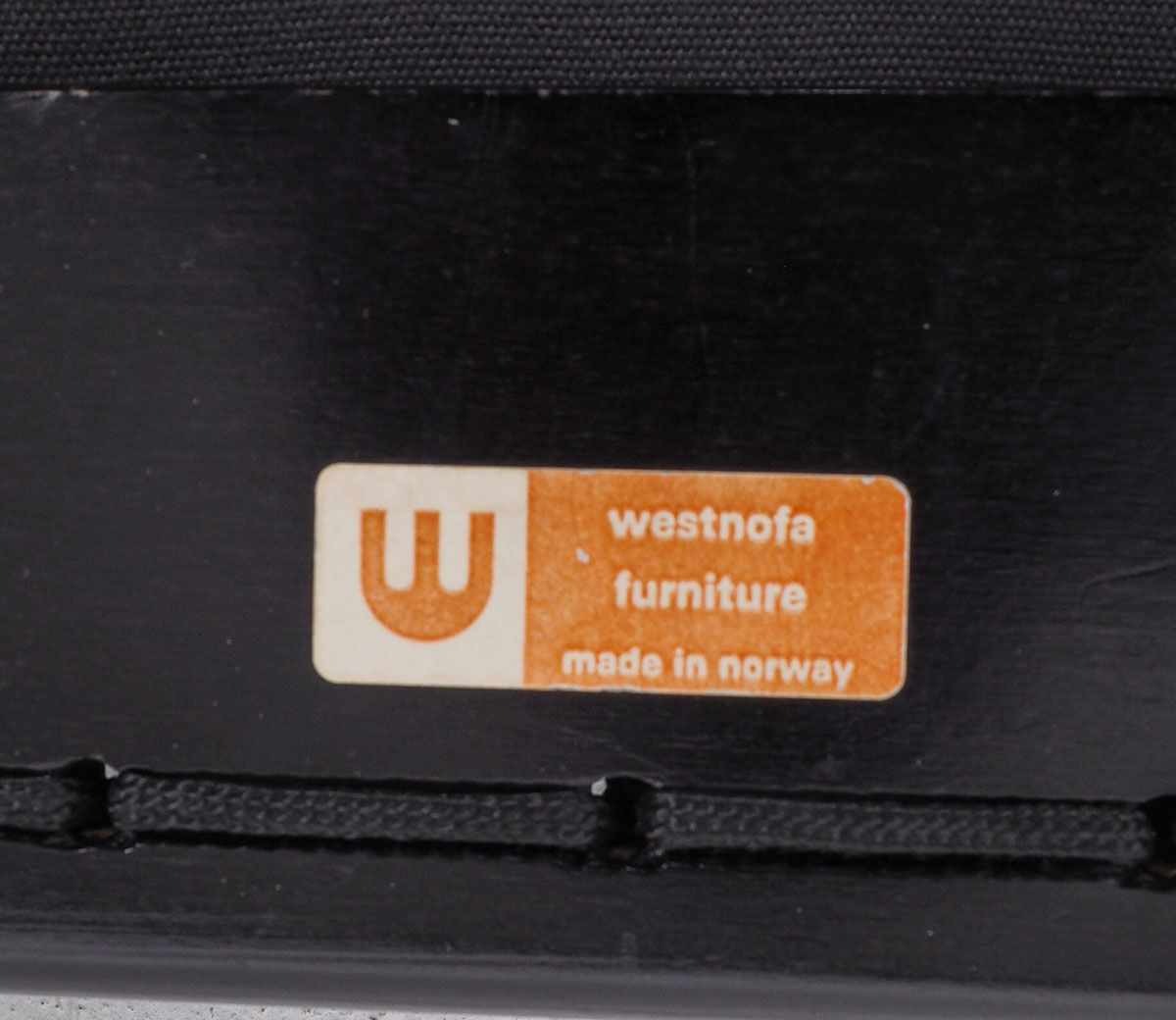 Westnofa black leather Flex armchair with ottoman