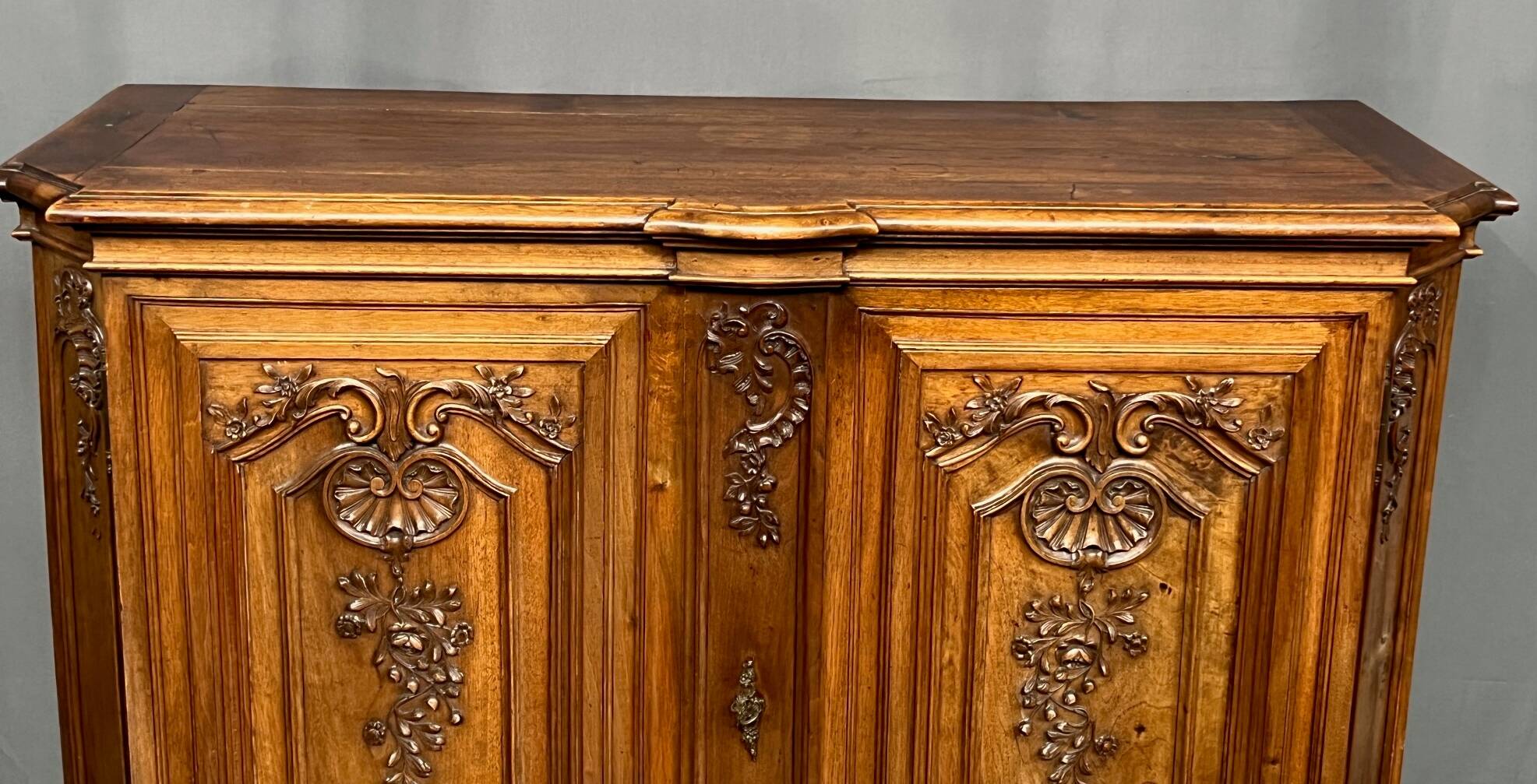 Louis XV style carved walnut chest of drawers