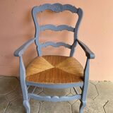 Provencal style straw armchair with gray blue patina armrests