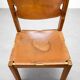 Set of 4 chairs from the 1960s in elm and patinated leather.