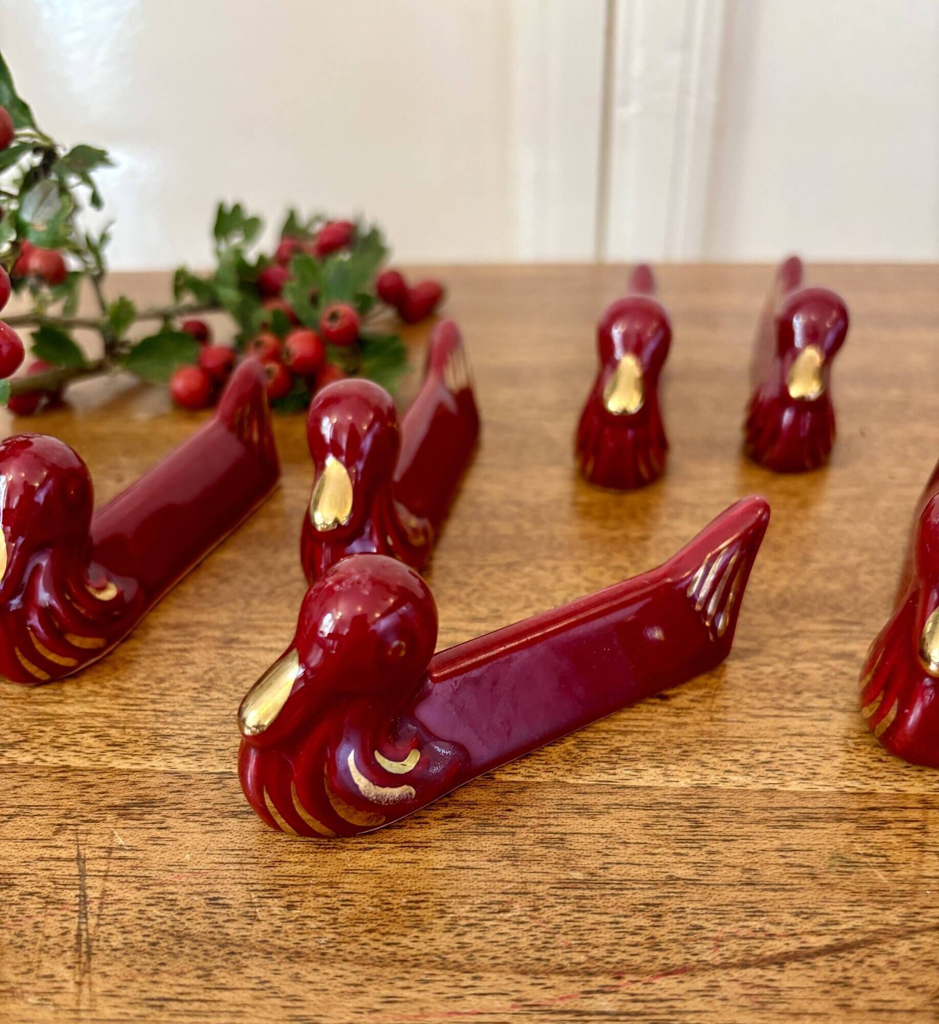 Set of 8 vintage slip knife holders in the shape of red ducks and