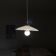 Old lampshade in white opaline glass with a wavy edge.