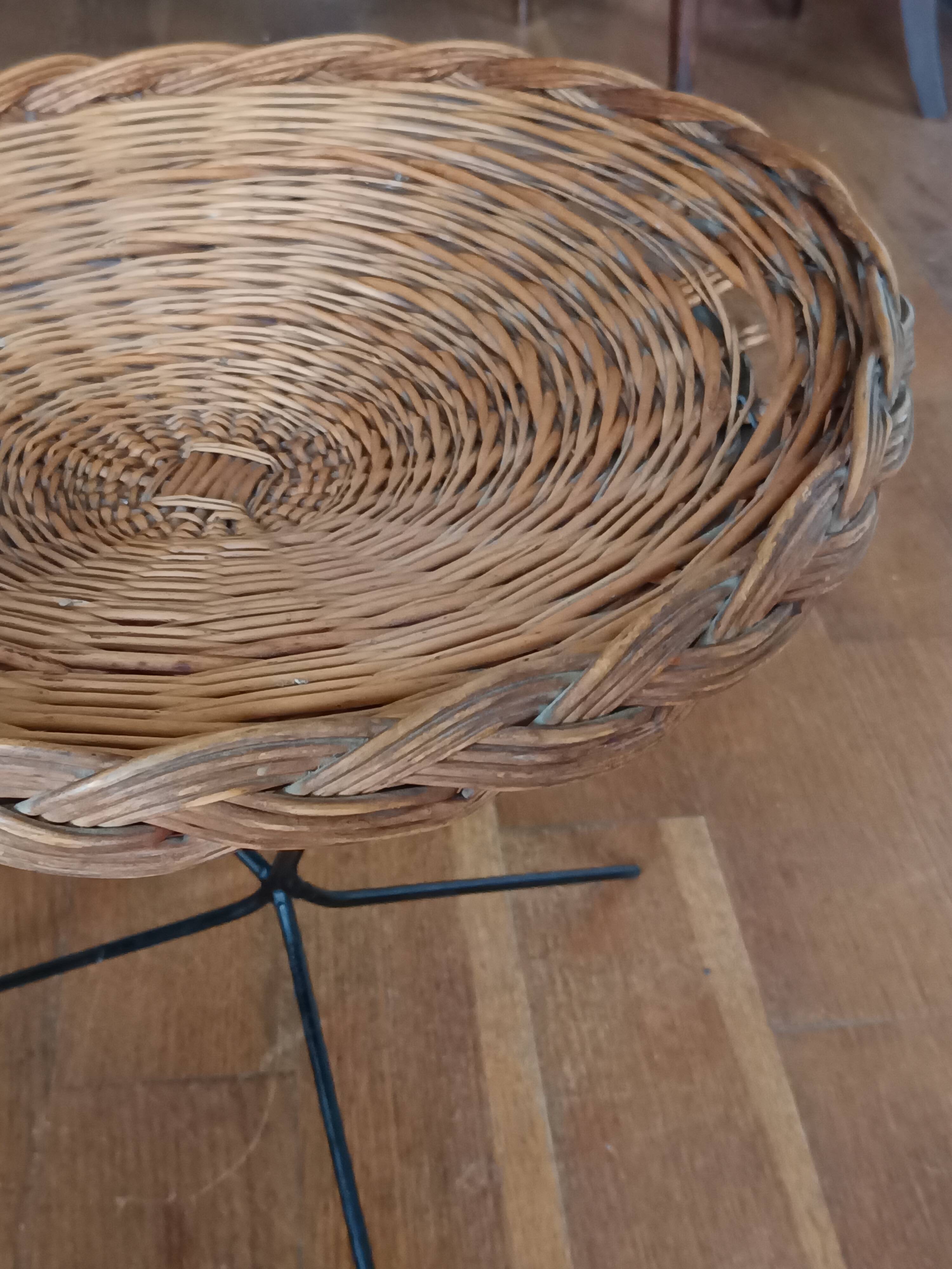 vintage wicker gueridon with a black metal tripod base from the 1960s