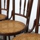 4 antique wooden and cane bistro chairs