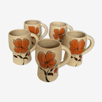 Series of five flowery ceramic mugs signed 60s