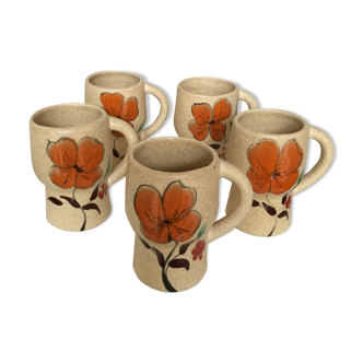 Series of five flowery ceramic mugs signed 60s