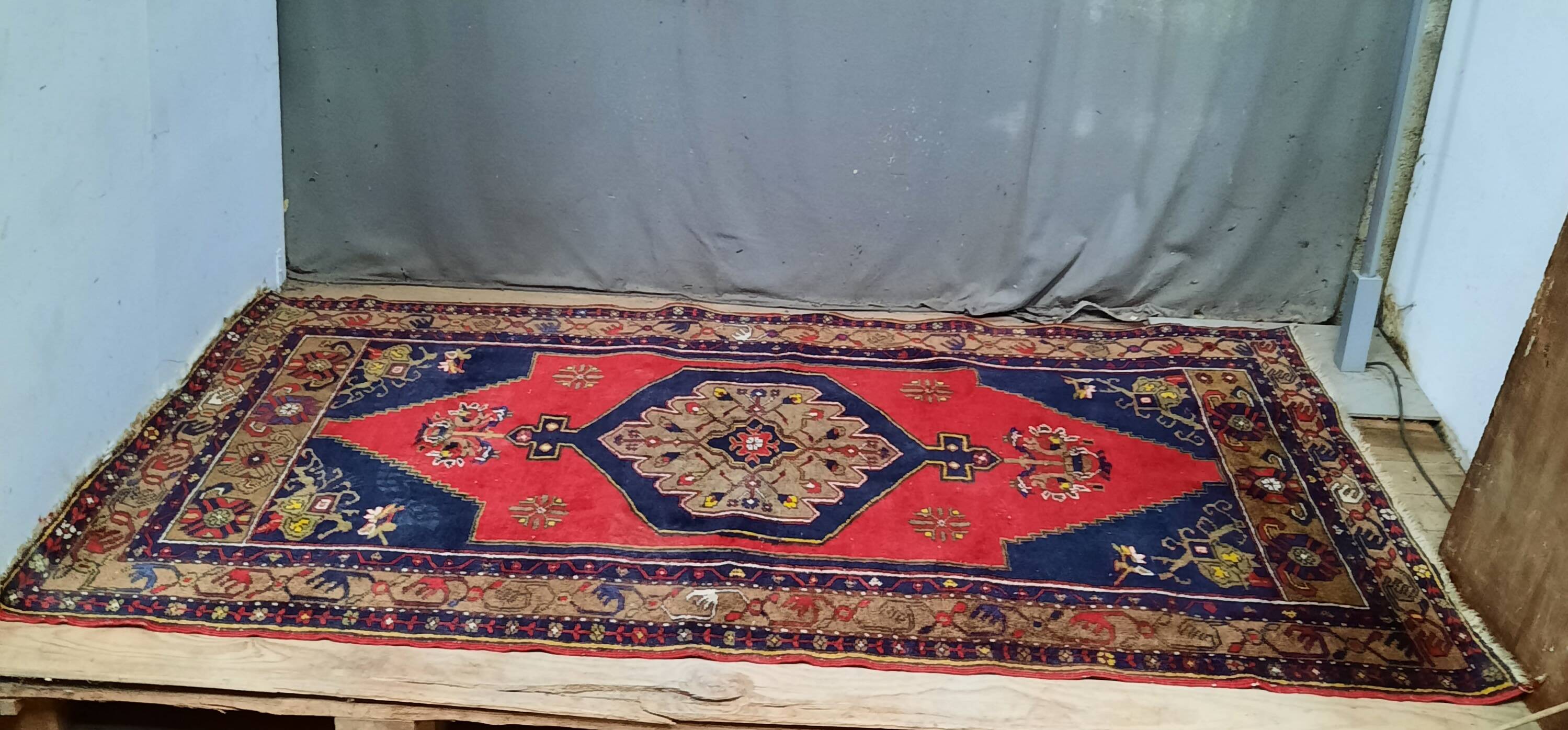 Handmade blue and red rug