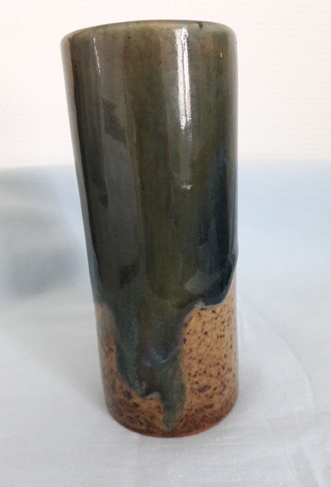 Signed sandstone roll vase