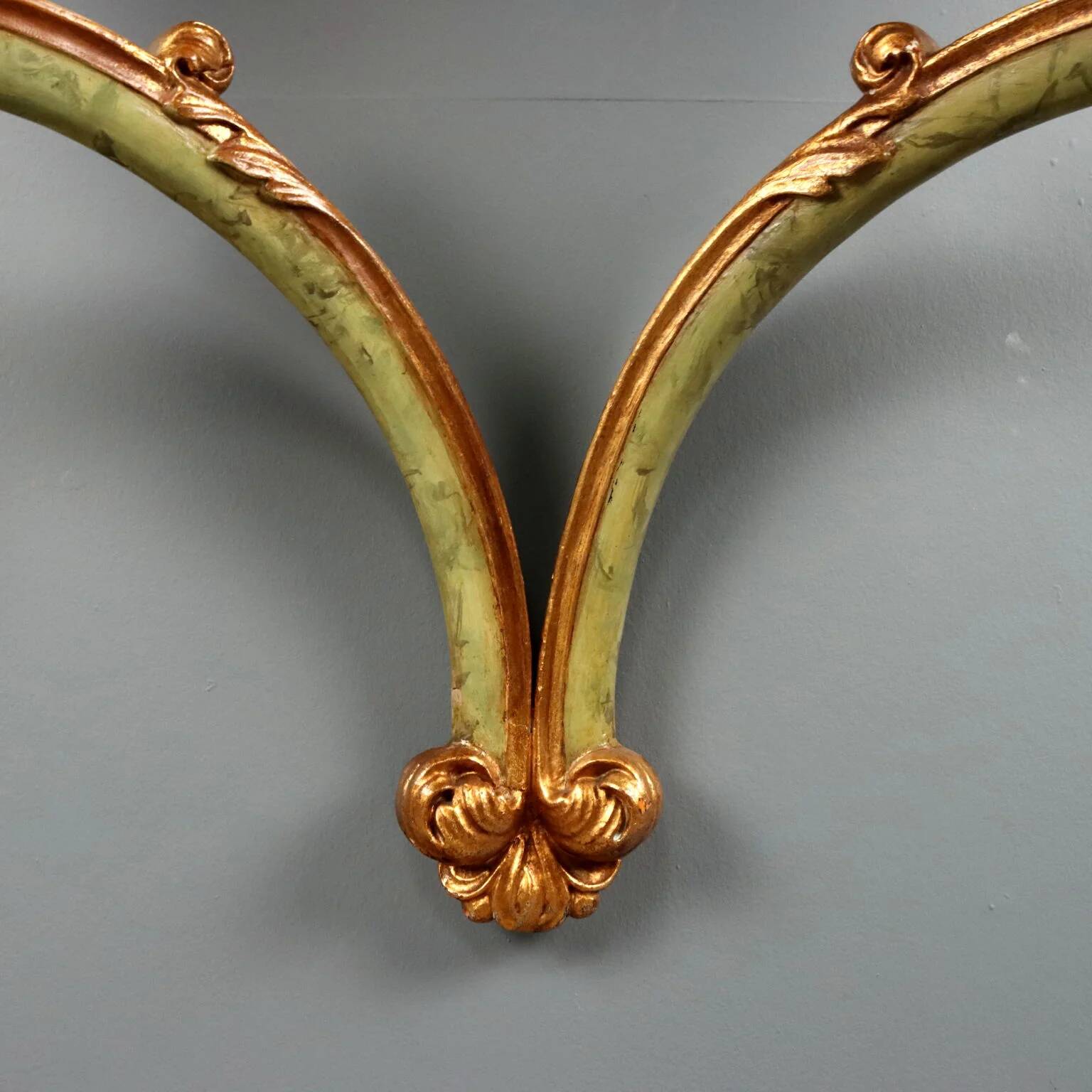 19th-century carved wooden drop-leaf console.