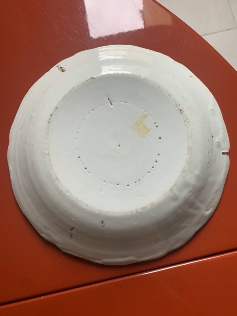 Antique earthenware soup plate with plum decoration