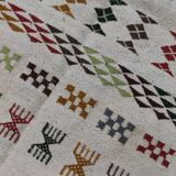 Handmade rugs in natural wool with traditional patterns