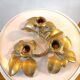 Bronze candle holder with three flowers design 60s - 70s