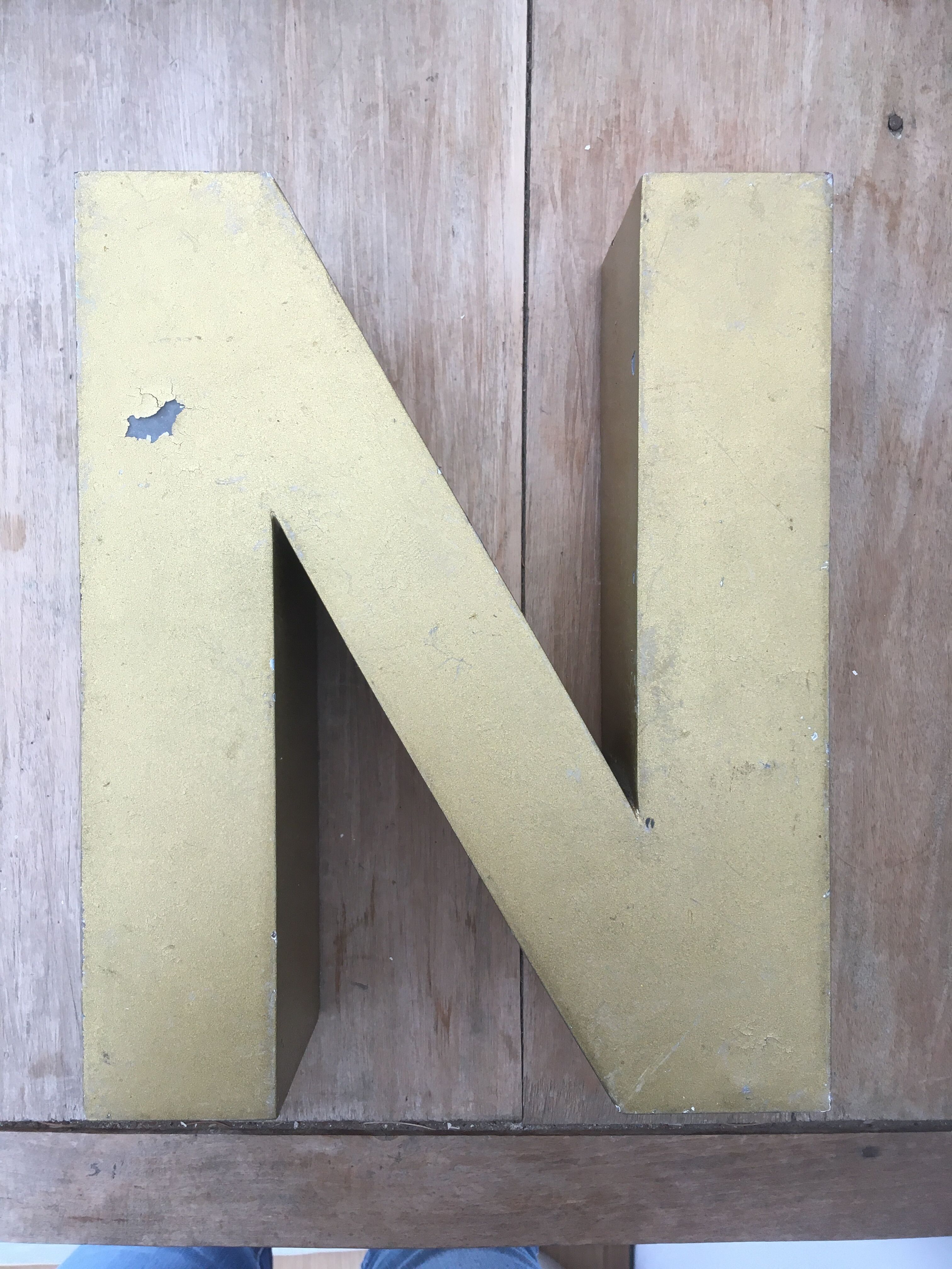 Golden vintage sign letter N