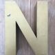 Golden vintage sign letter N