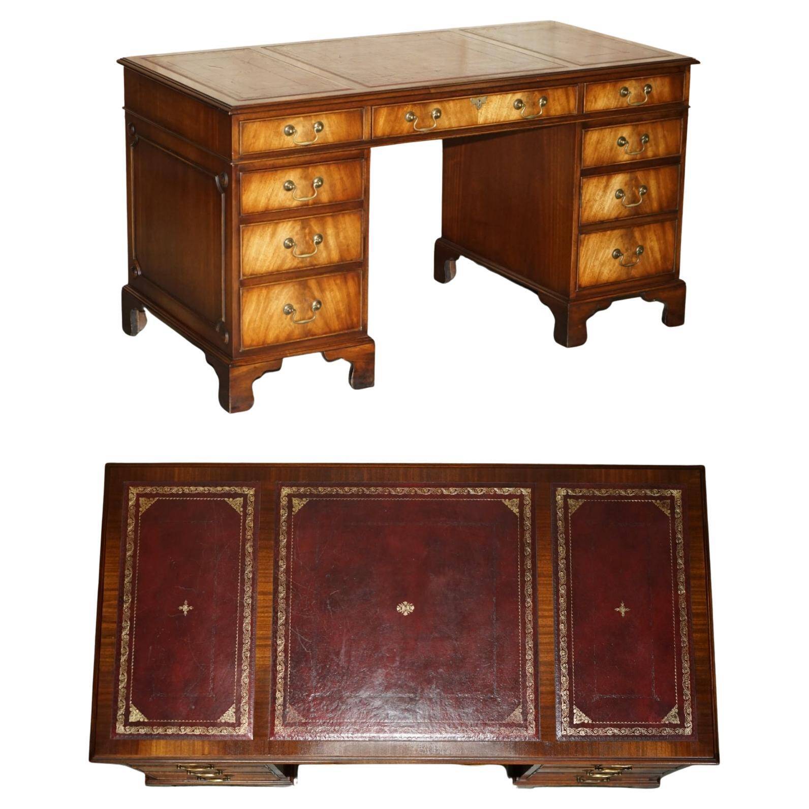 Partner desk Bevan Funnell in hardwood with leather top and gold leaf gilding.