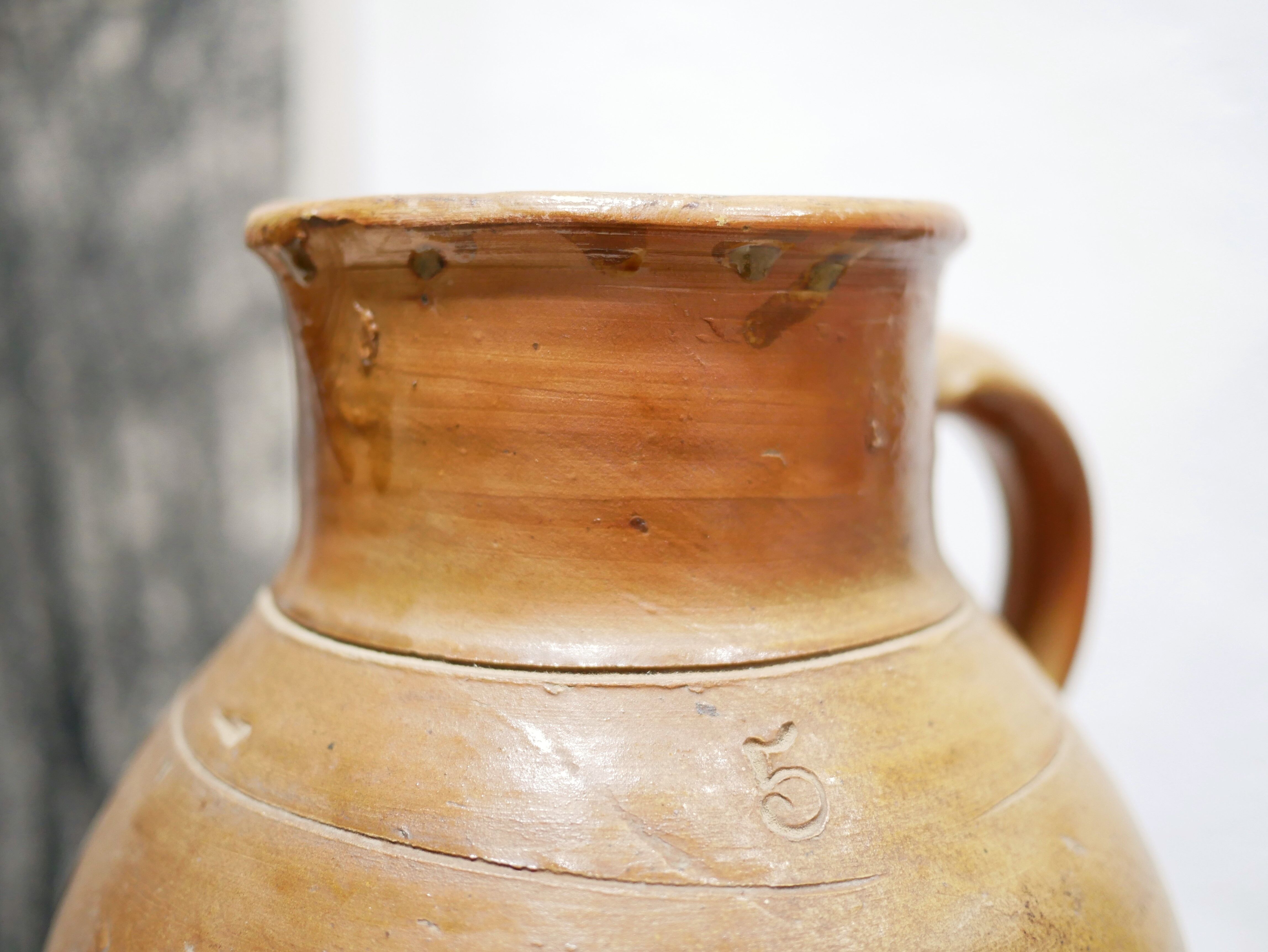 Pot à lait vintage en terre cuite vernissée