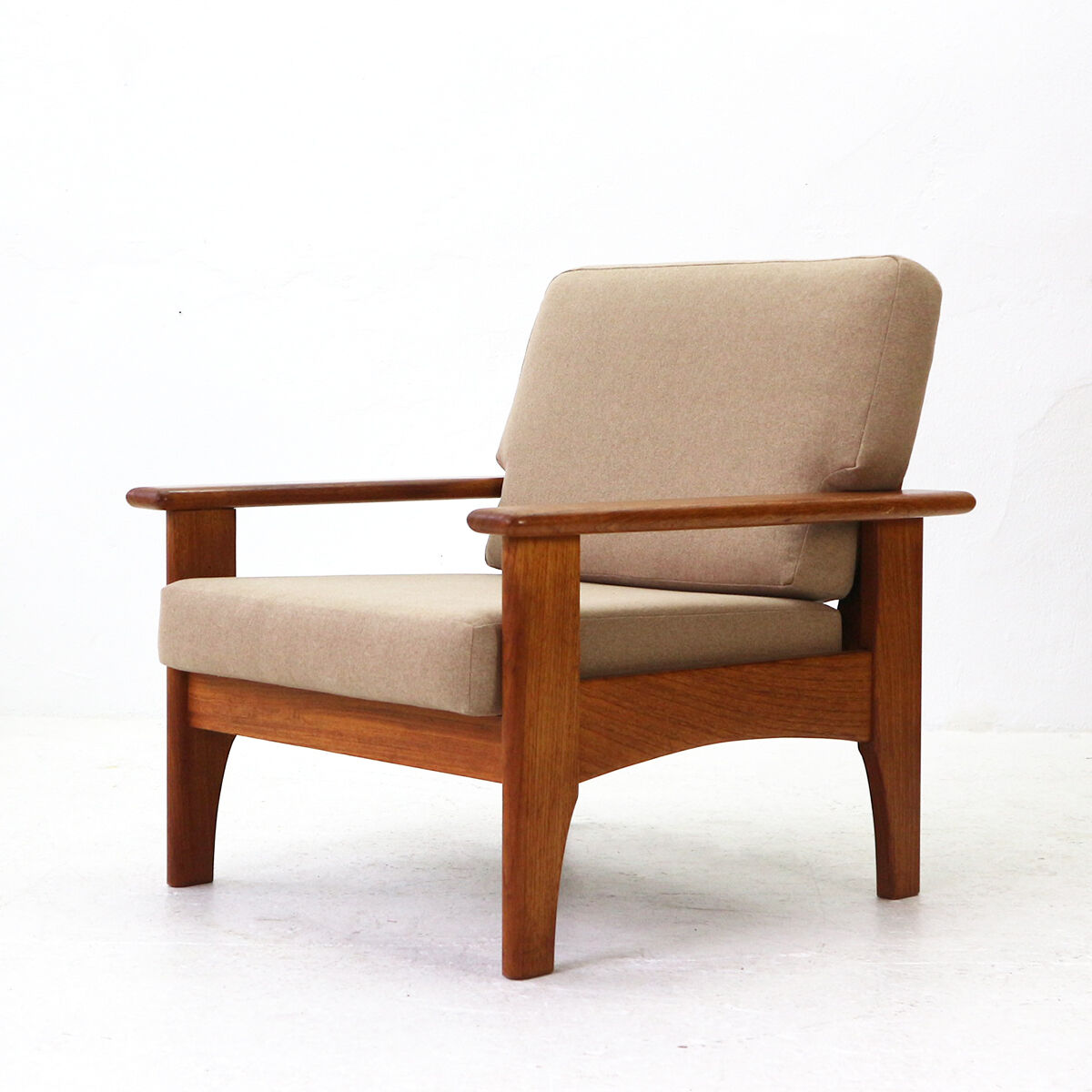 Mid-century scandinavian teak armchair with new covers