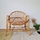 Vintage adult rattan armchair from the 1960s.