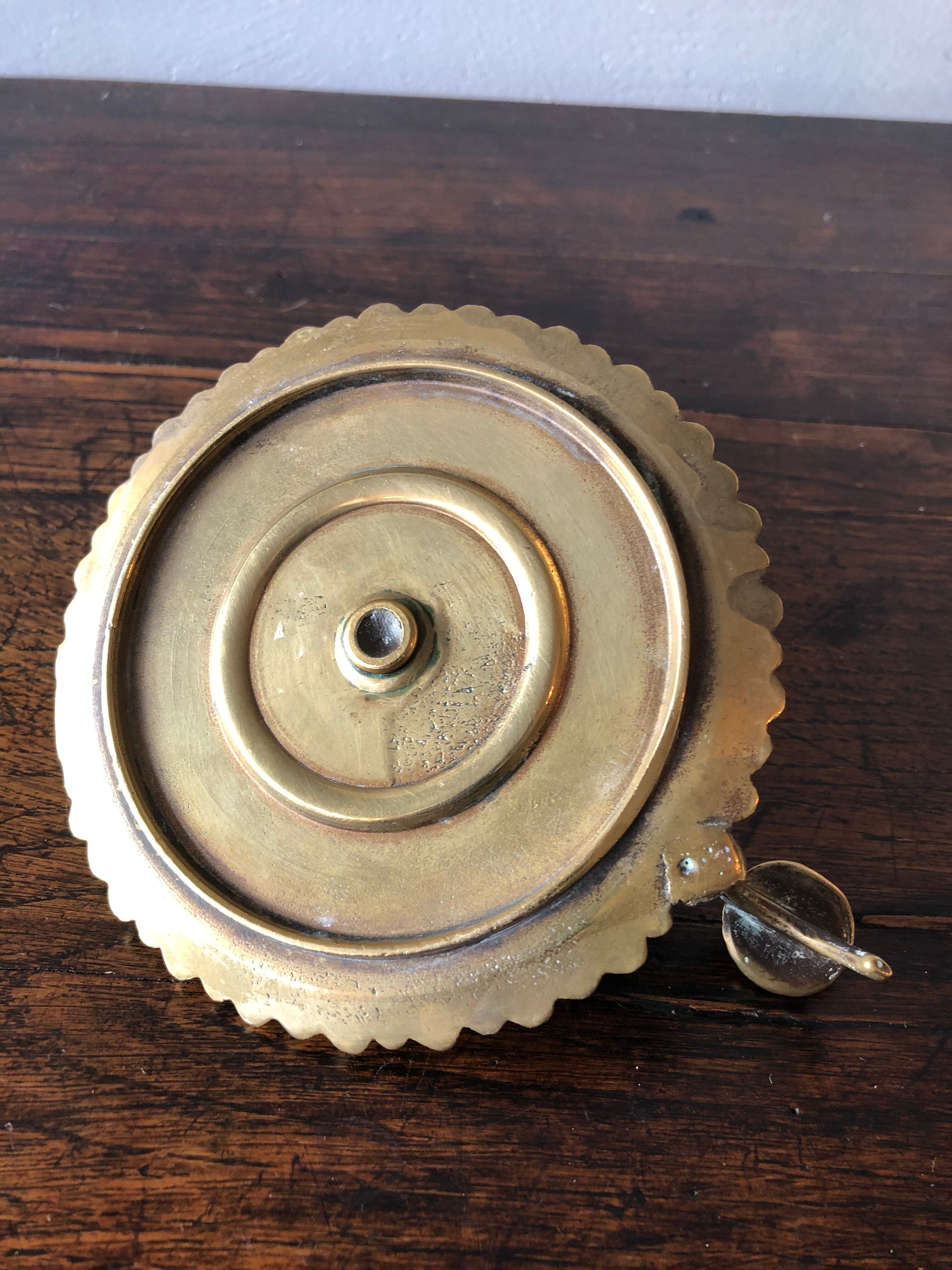 Brass hand-held candlestick