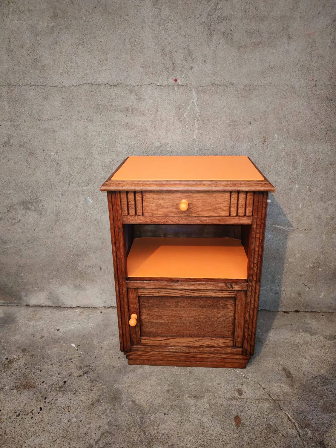 Art Deco orange bedside table