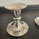 Pair of vintage candle holders in silver metal