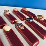 Set of vintage red ceramic knife holders, marine motif, retro style