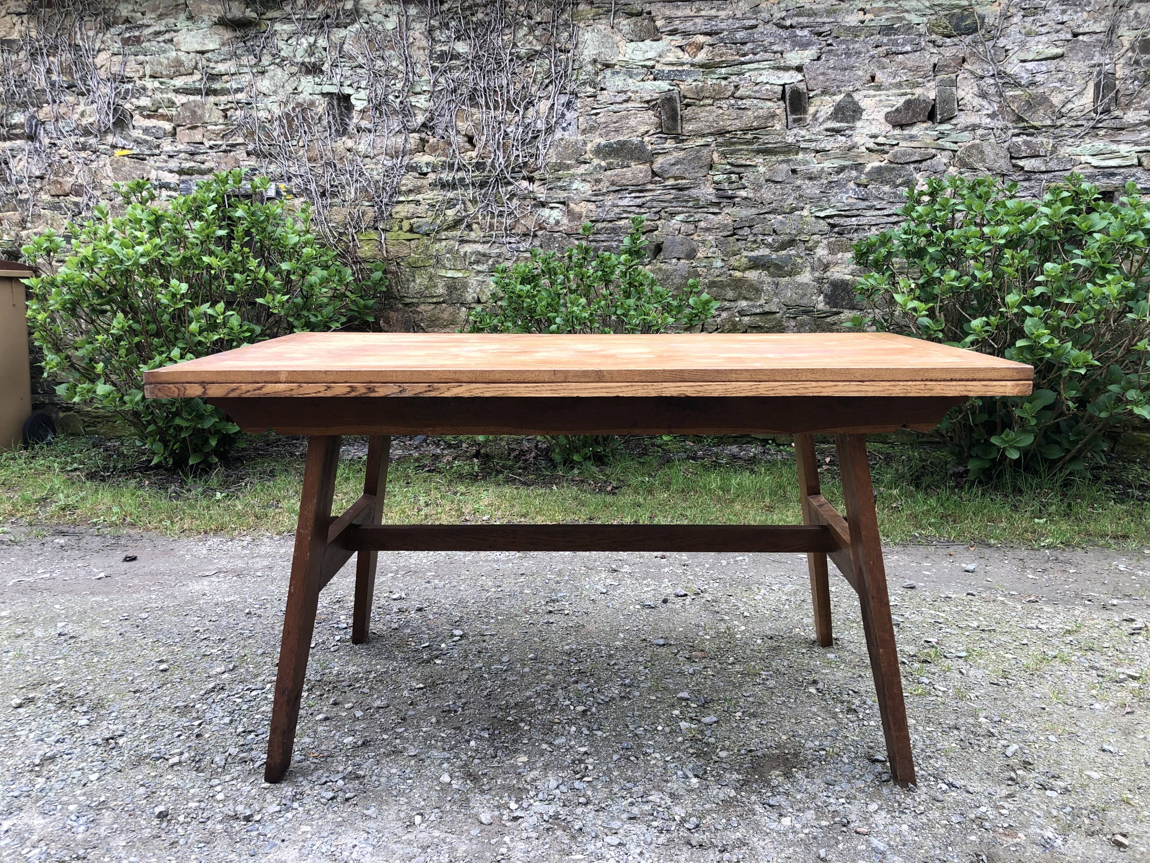 Vintage René Gabriel oak table from the reconstruction period.