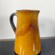 Vintage glazed terracotta pitcher