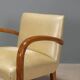 Pair of vintage armchairs in beech and faux leather, Italian design, 1960s.