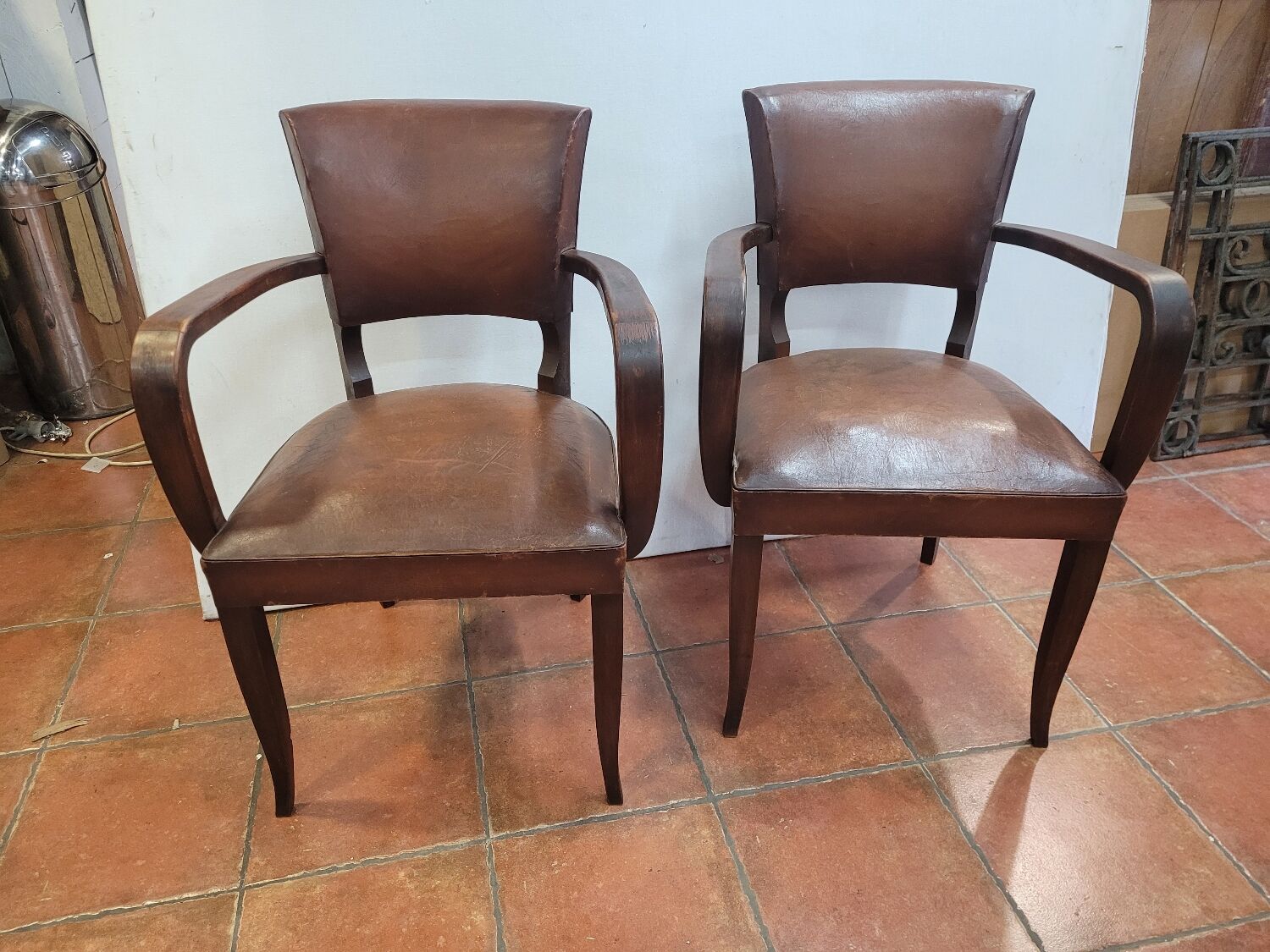 Pair of antique leather bridge armchairs