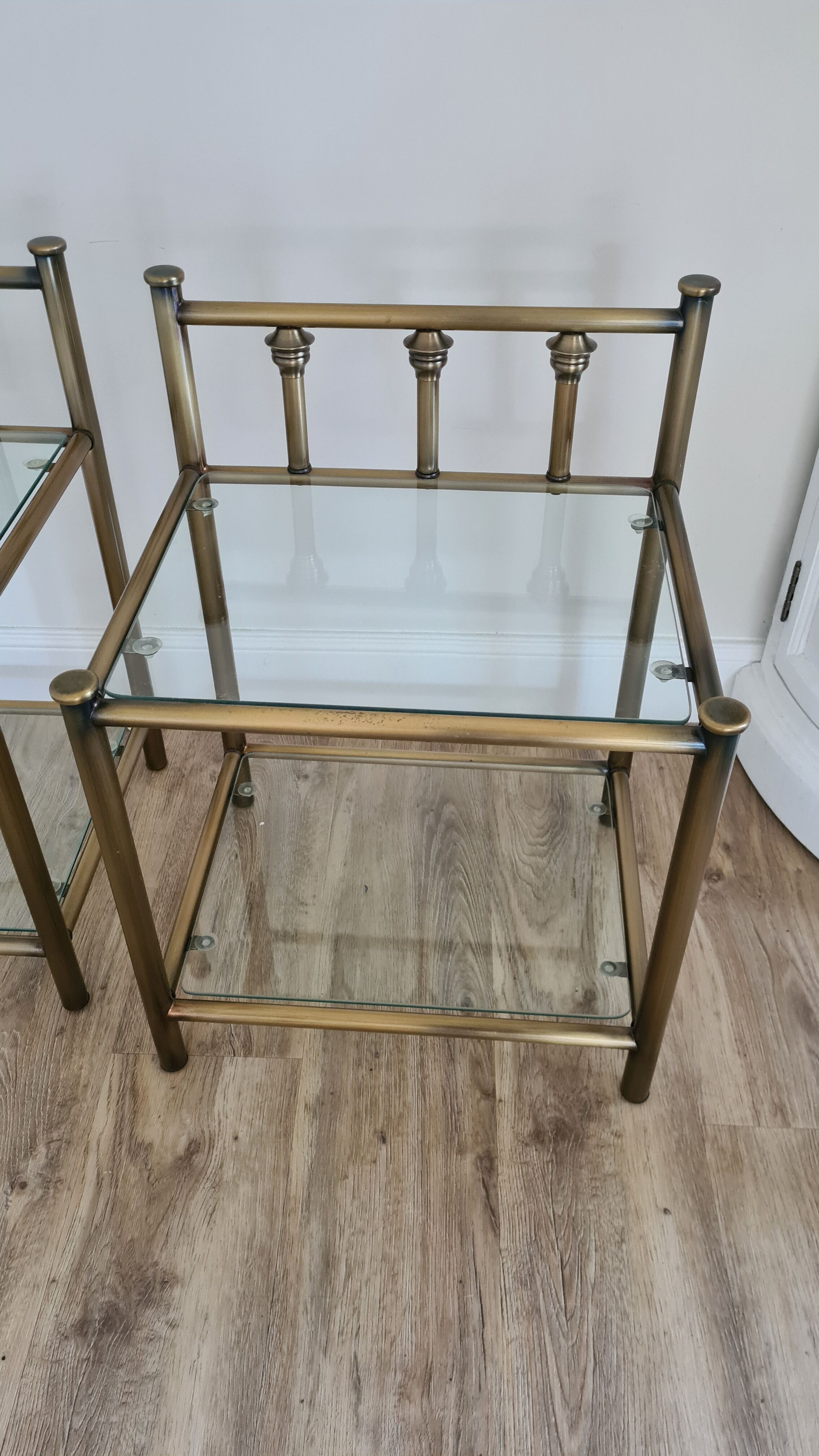 Old pair of glass and brass bedside tables, 80s