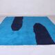 Handmade artisan rug in beige, size 150x250 cm.