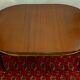 Louis XVI style mahogany oval or round table with extensions, 8 people