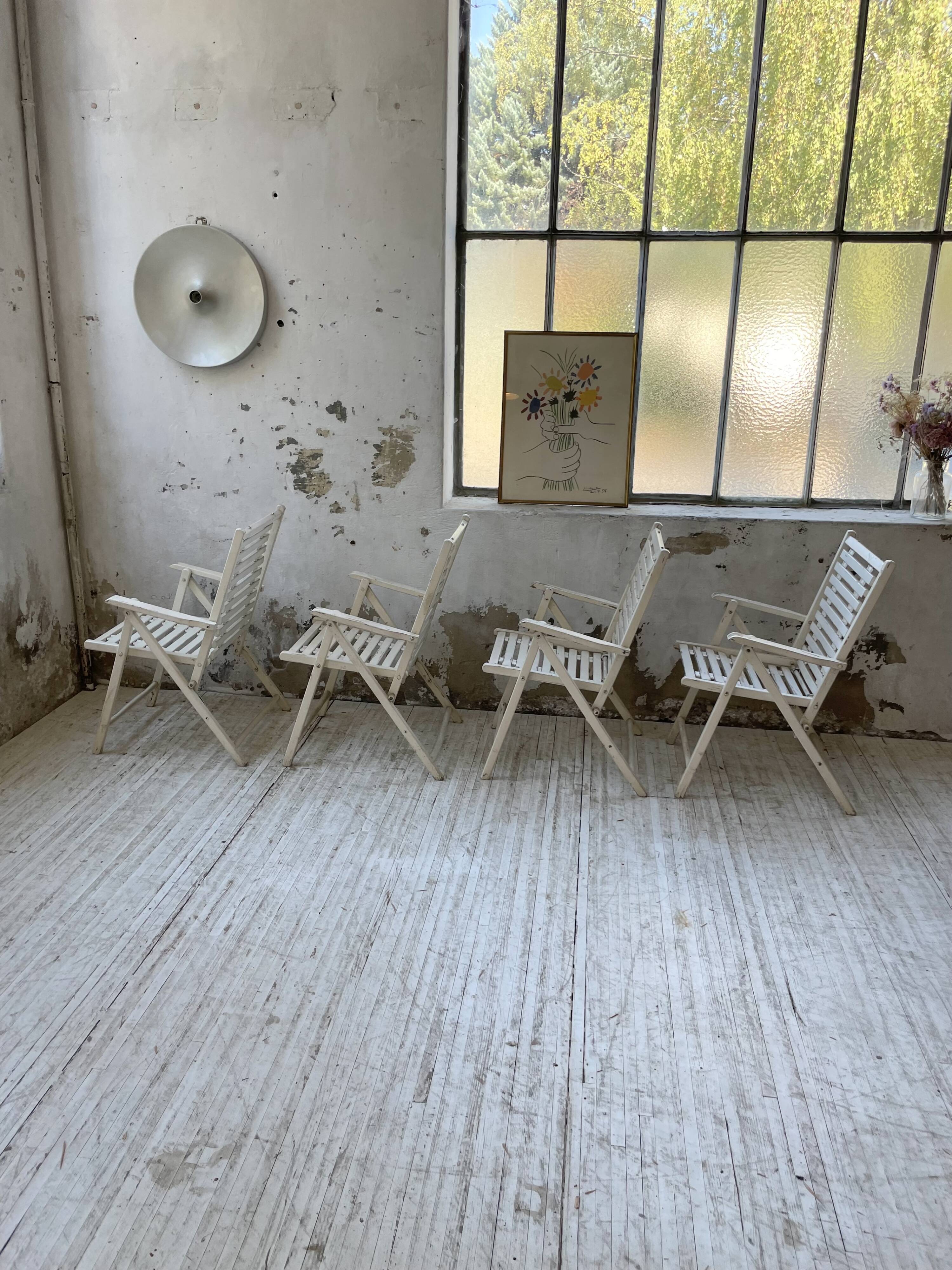 4 white wooden garden chairs