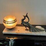 Art deco peacock lamp in regule on marble