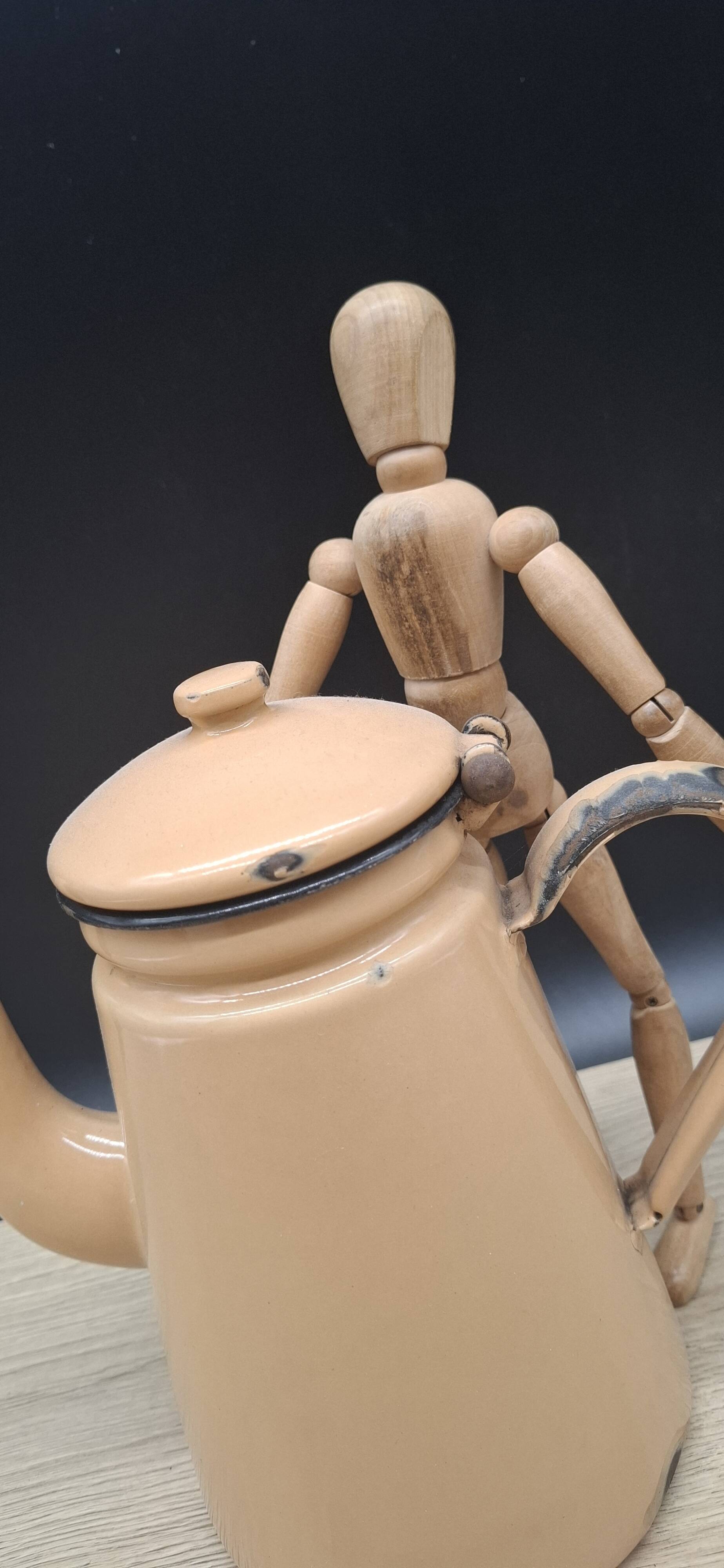 Beige enamel coffee pot