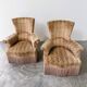 Pair of sculptural Hollywood Regency lounge chairs with original fringed upholstery
