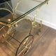 Neo classical style table in silver and gold metal and glass