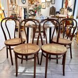 Wooden and cane bistro chairs