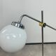 Modern mid-century chrome floor lamps in pairs