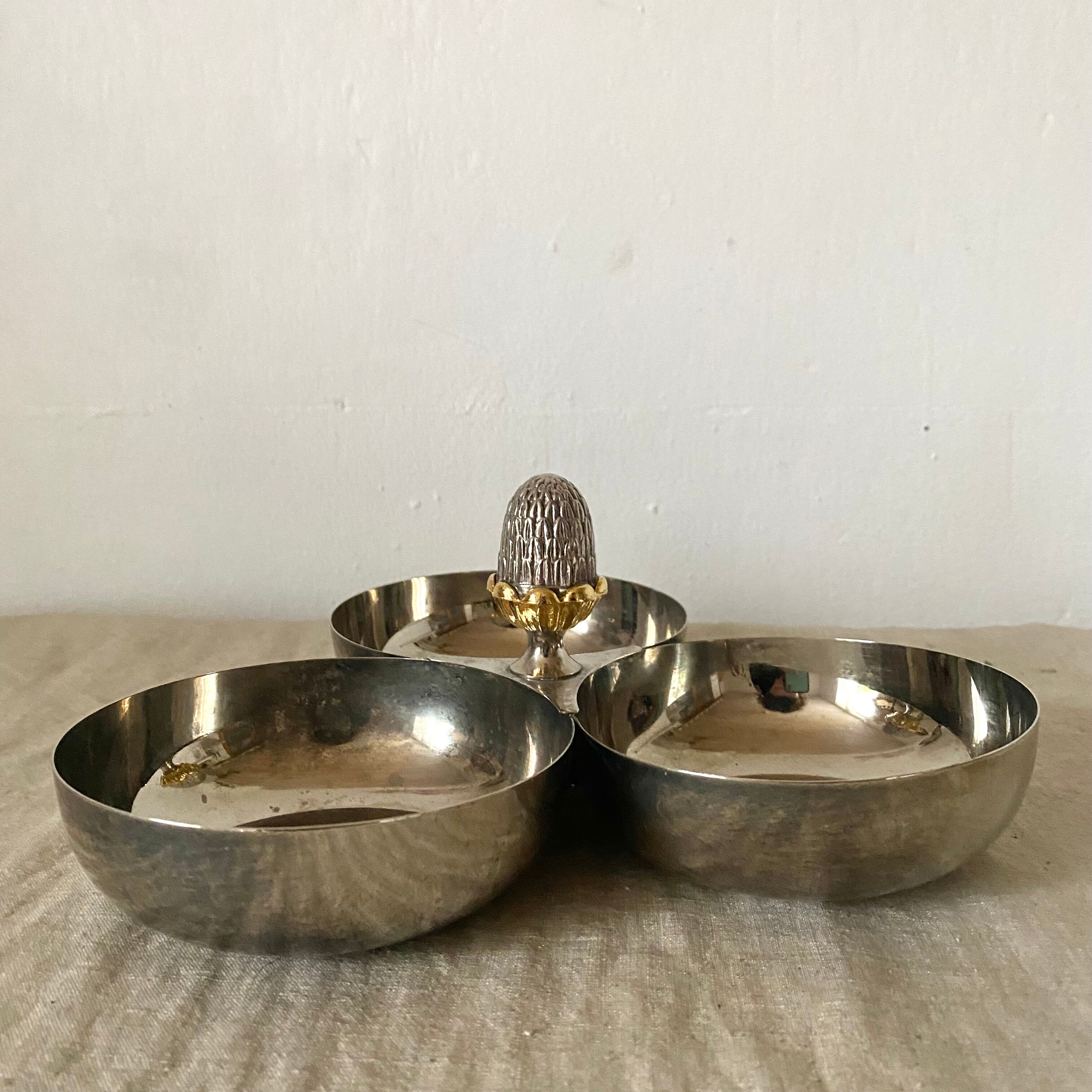 Servant in silver metal pine cone