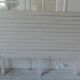 Headboard of 160 made with aged wood in pearl grey patina.