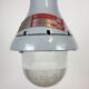 Grey industrial explosion proof light from Crouse-Hinds, 1970s