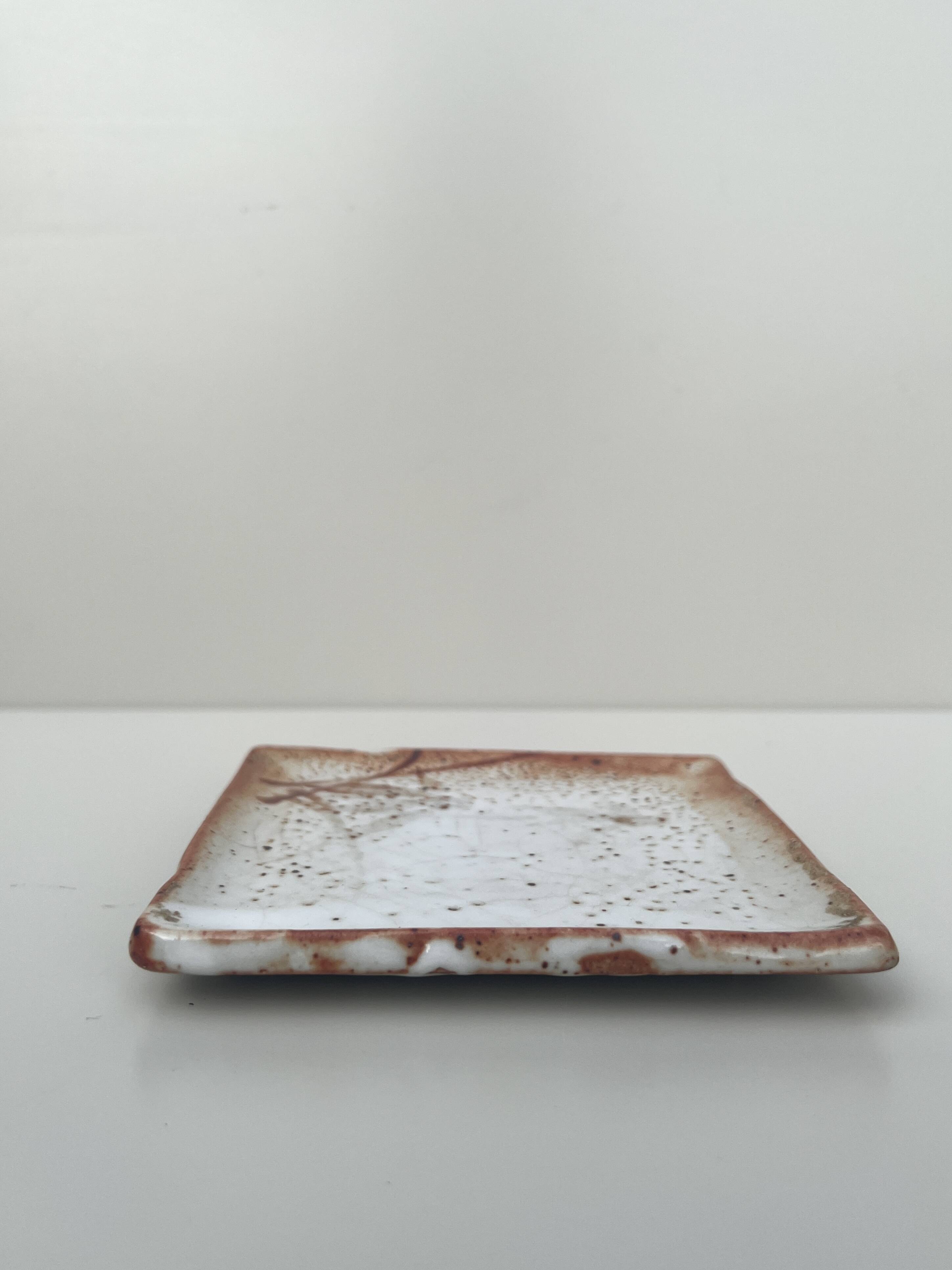 Empty pocket plate in Japanese stoneware.