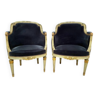 Pair of Louis XVI style armchairs in gray lacquered wood and gold trim, late 19th century